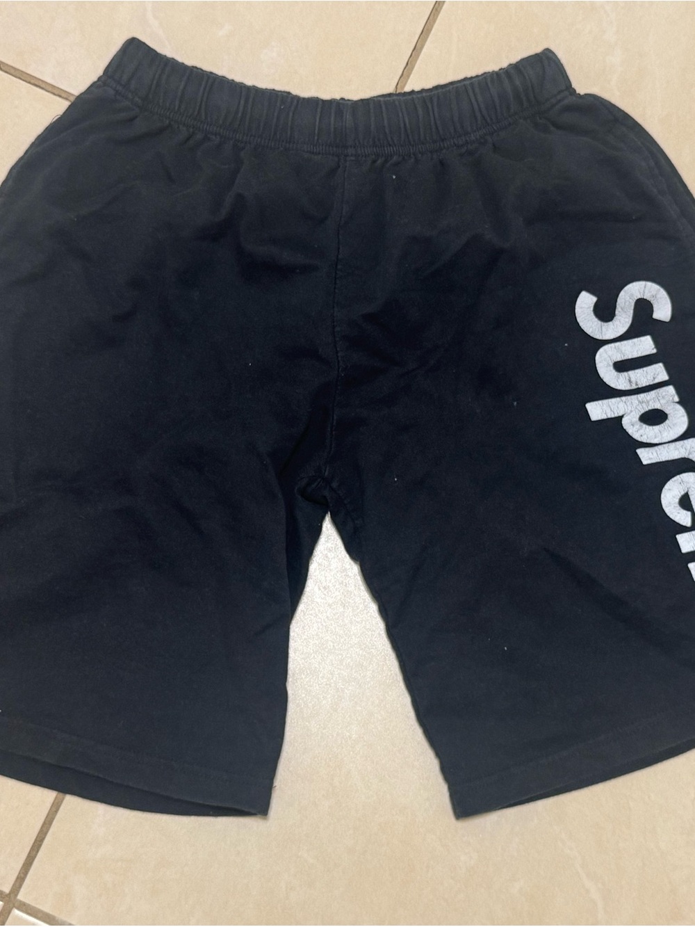 Supreme Men’s Black Shorts with Vertical White Logo